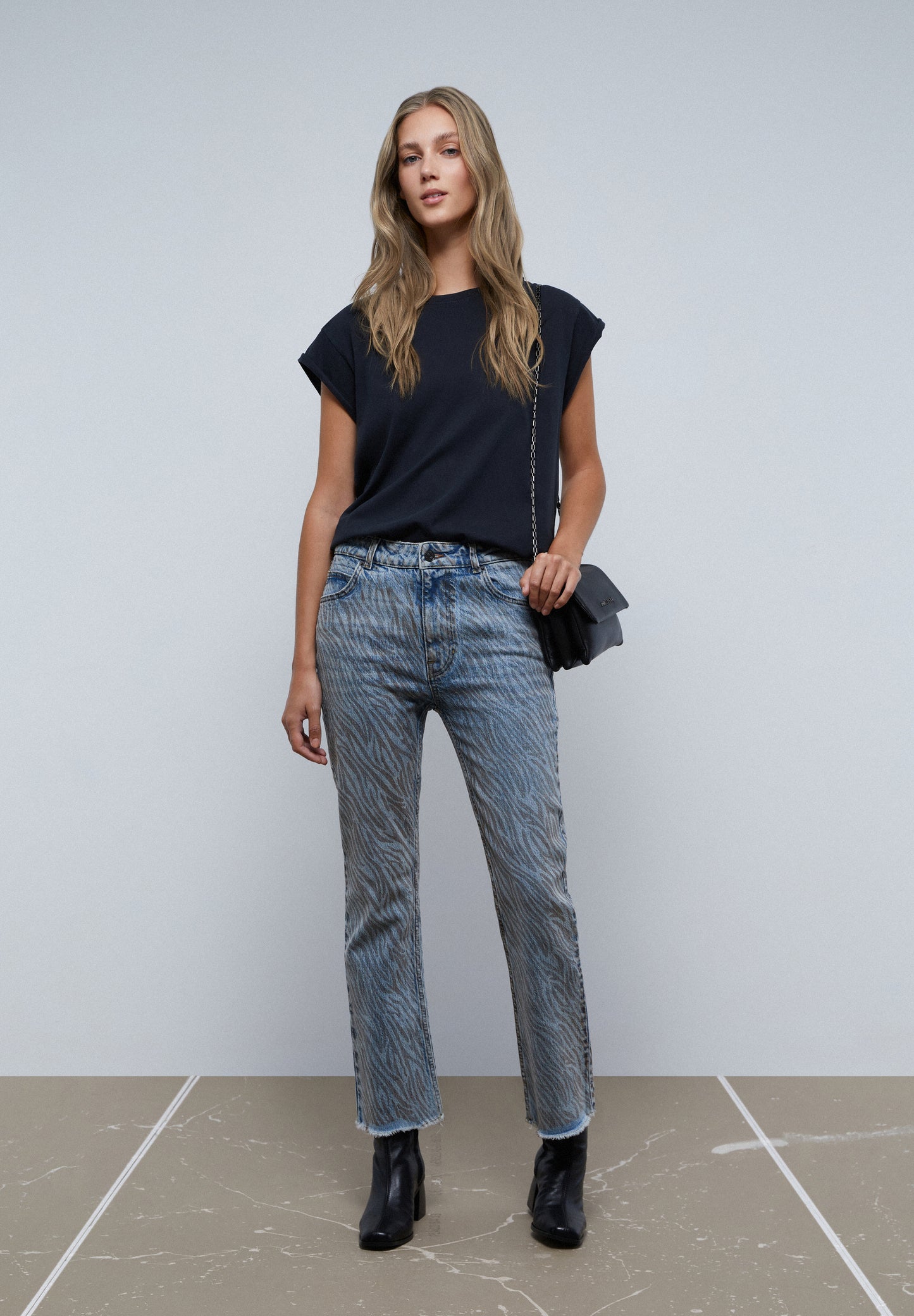 JEANS ANIMAL PRINT ANKLE FLARE