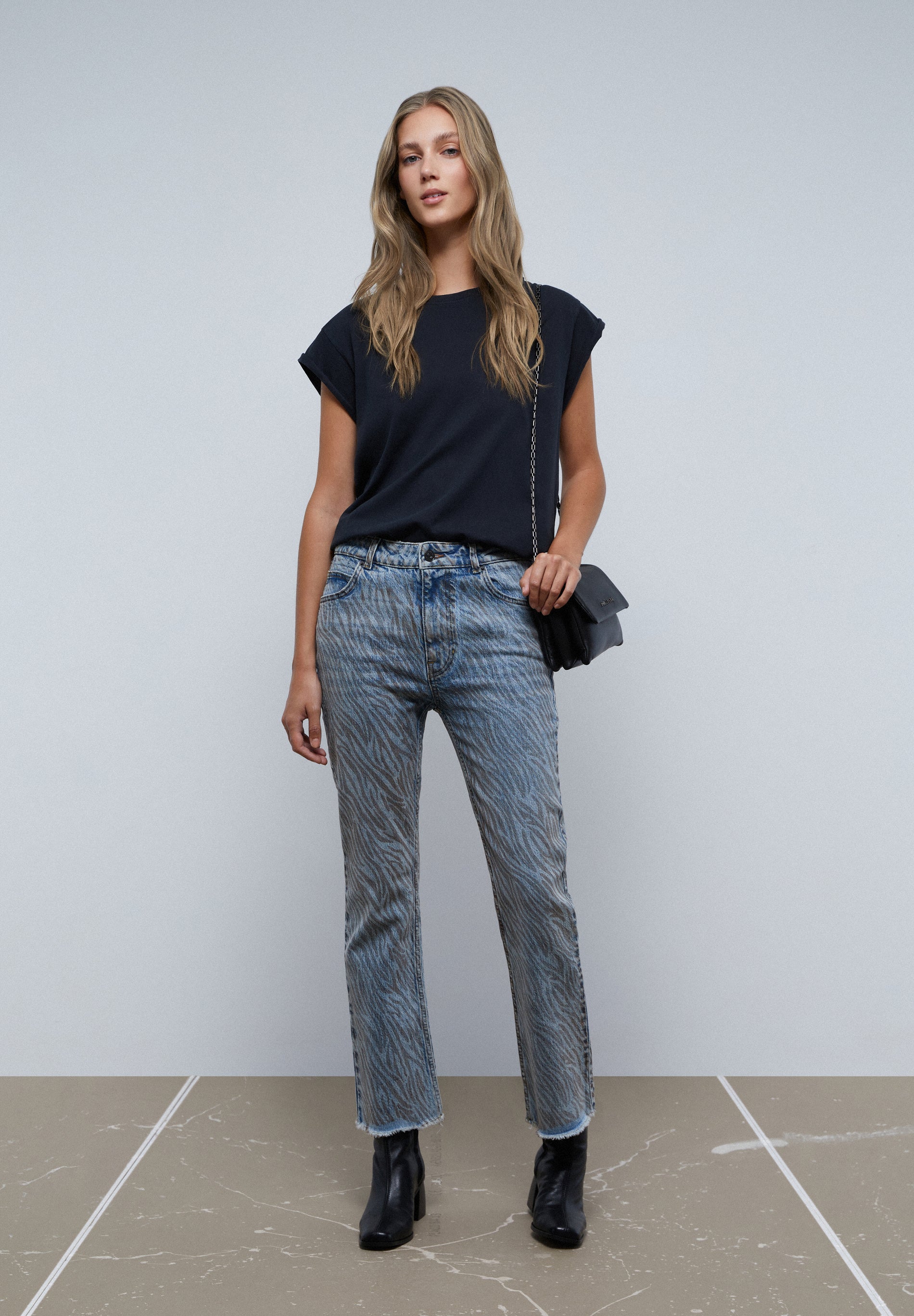 JEANS ANIMAL PRINT ANKLE FLARE