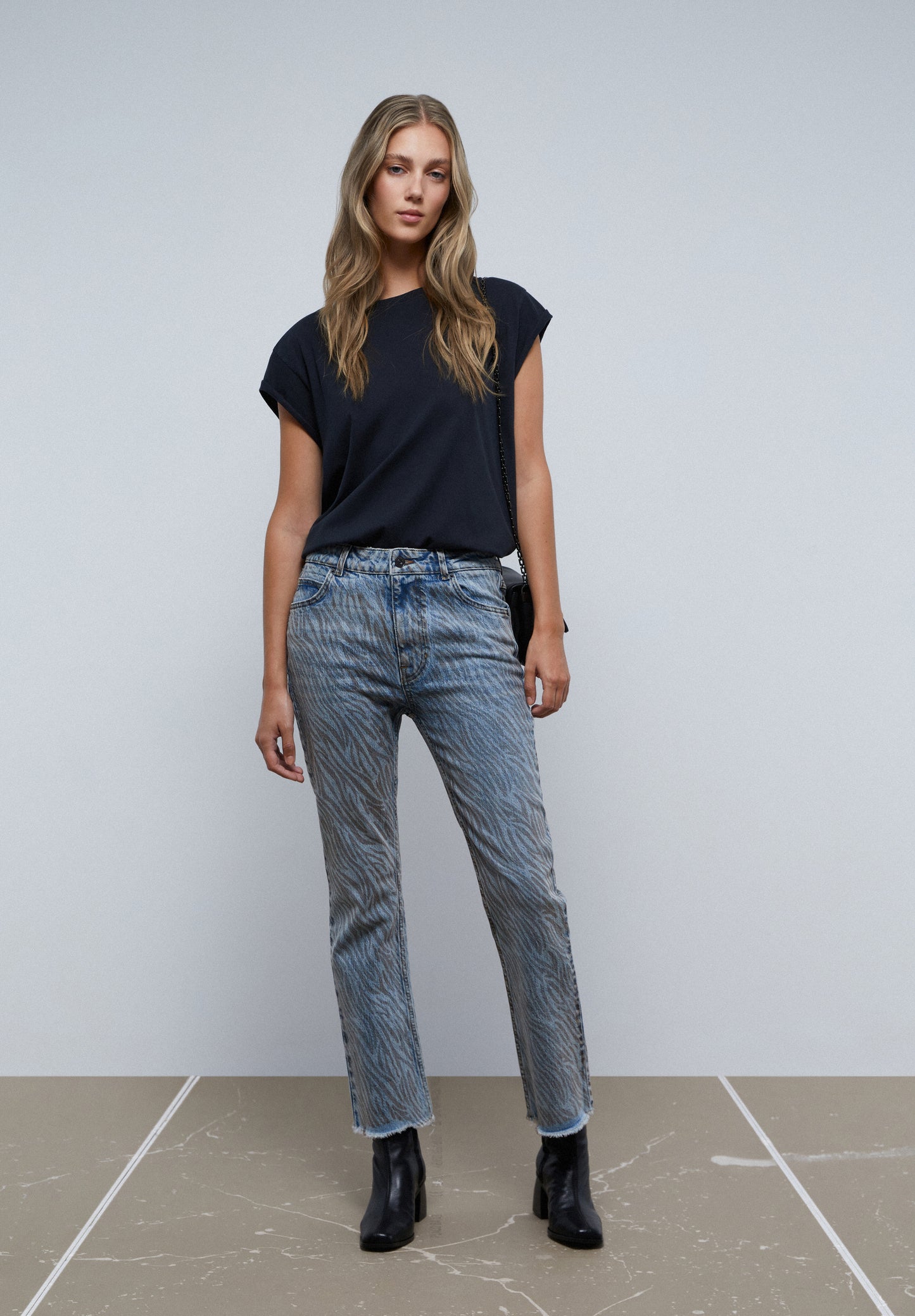 JEANS ANIMAL PRINT ANKLE FLARE