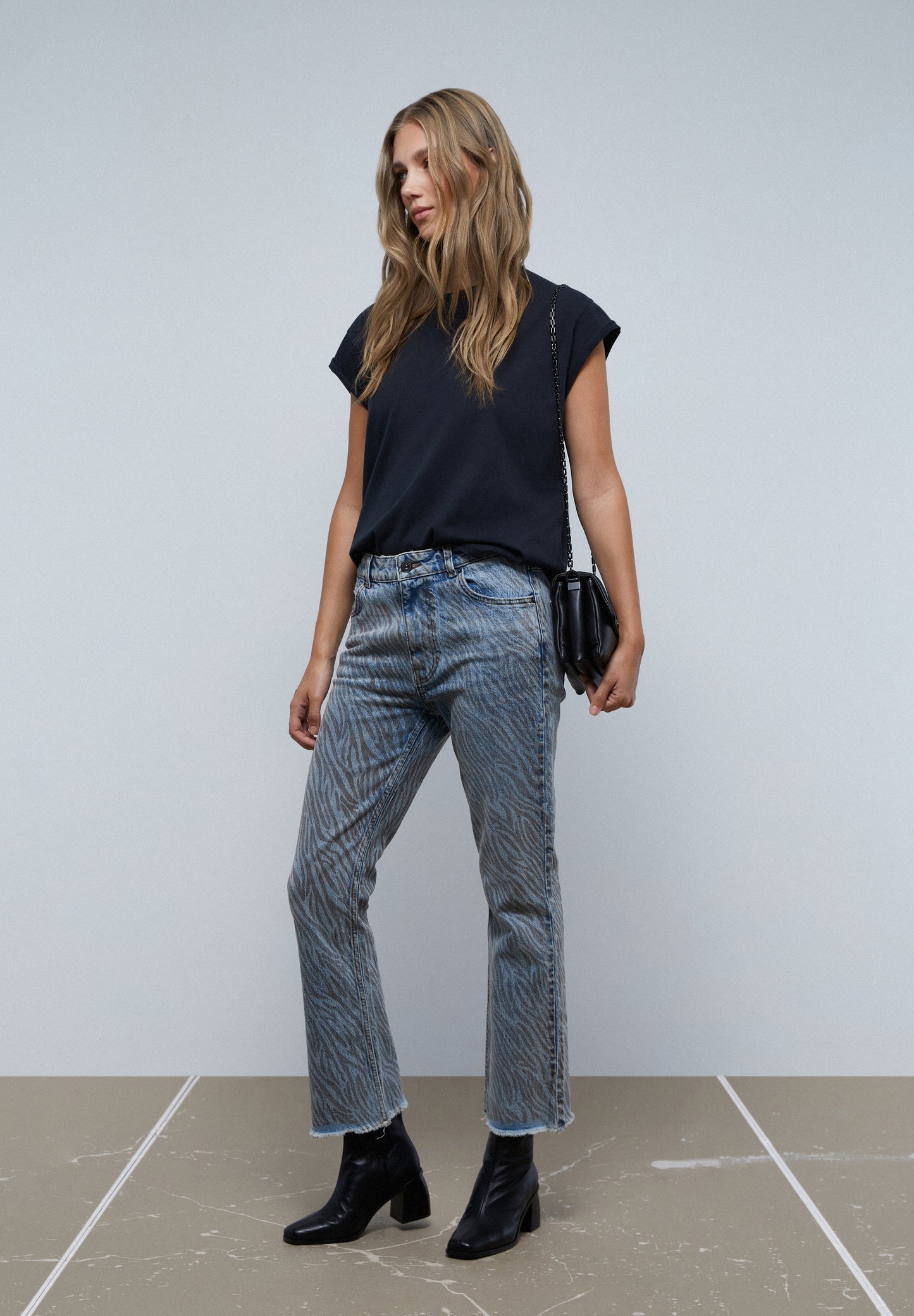 JEANS ANIMAL PRINT ANKLE FLARE