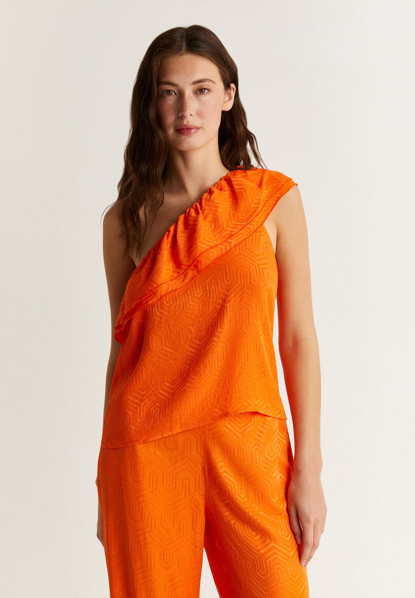 TOP ASIMÉTRICO VOLANTE