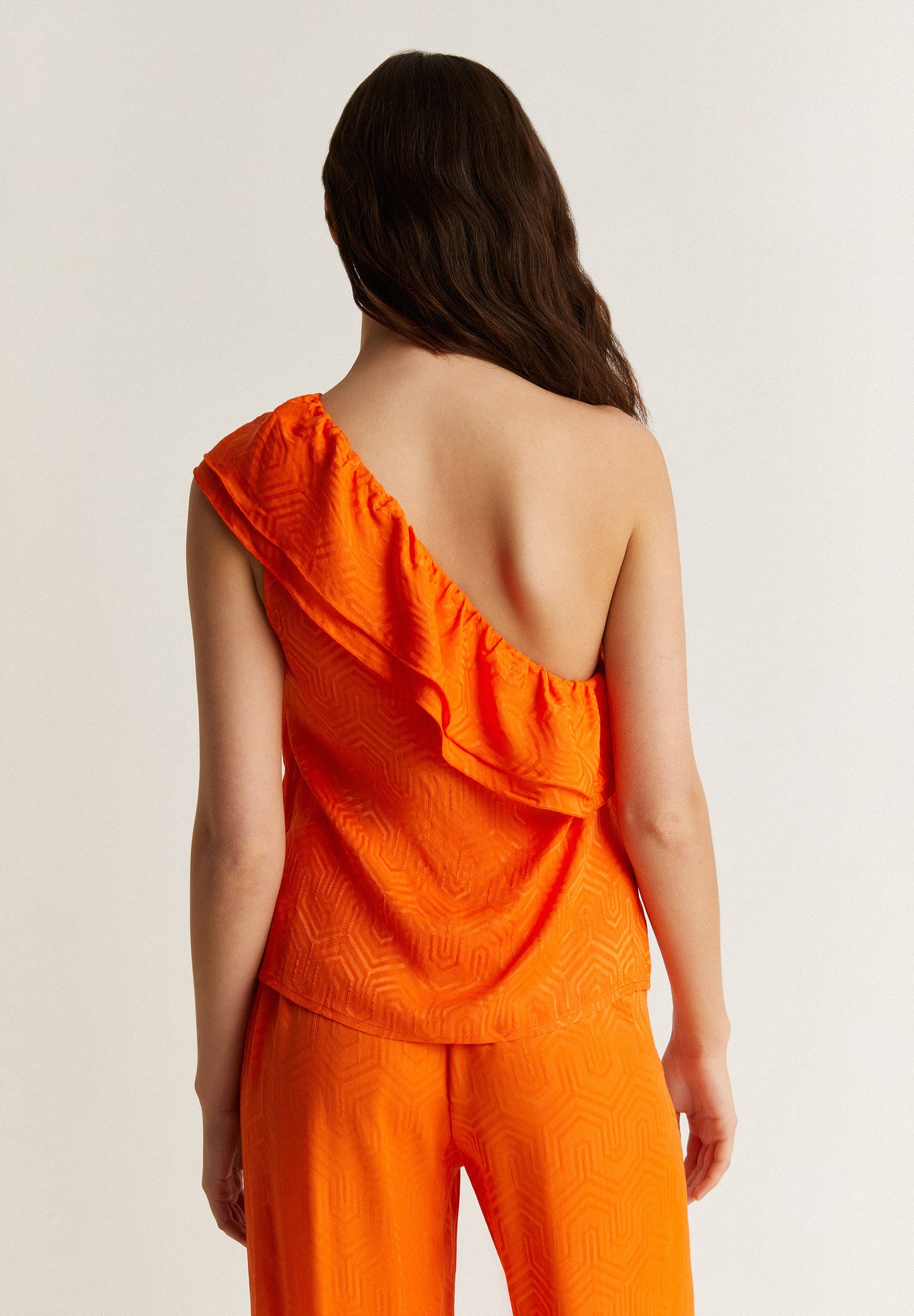 TOP ASIMÉTRICO VOLANTE