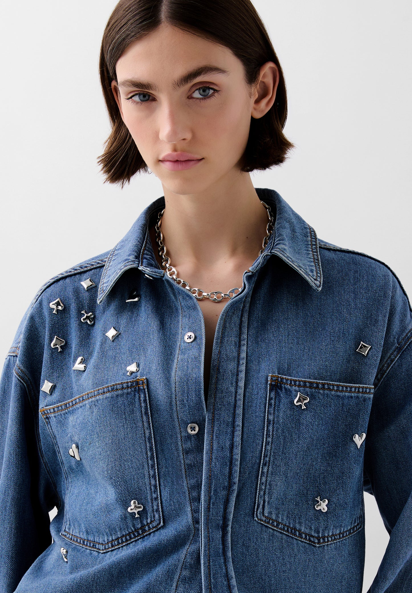 CAMISA DENIM TACHUELAS