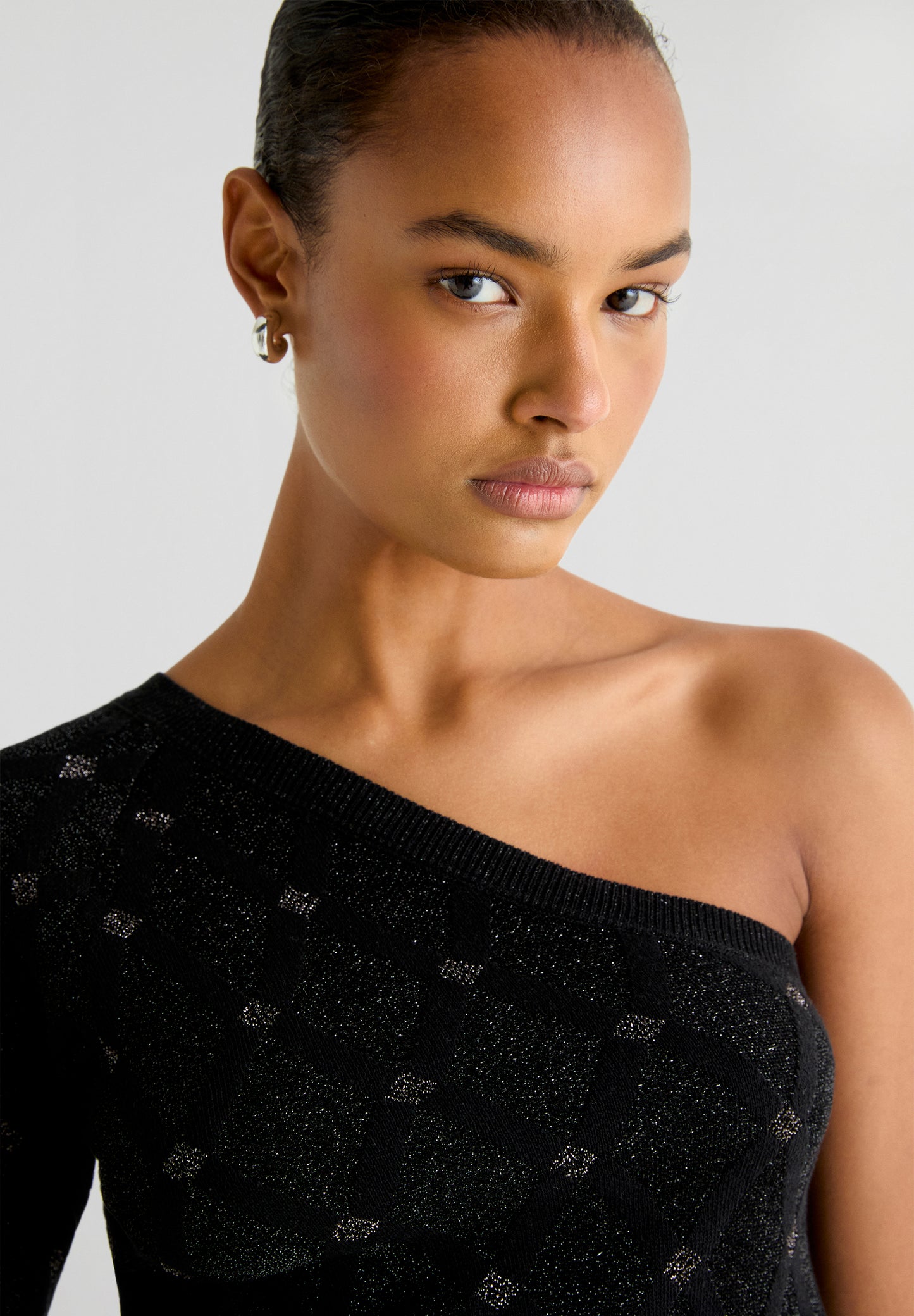 TOP PUNTO ASIMÉTRICO