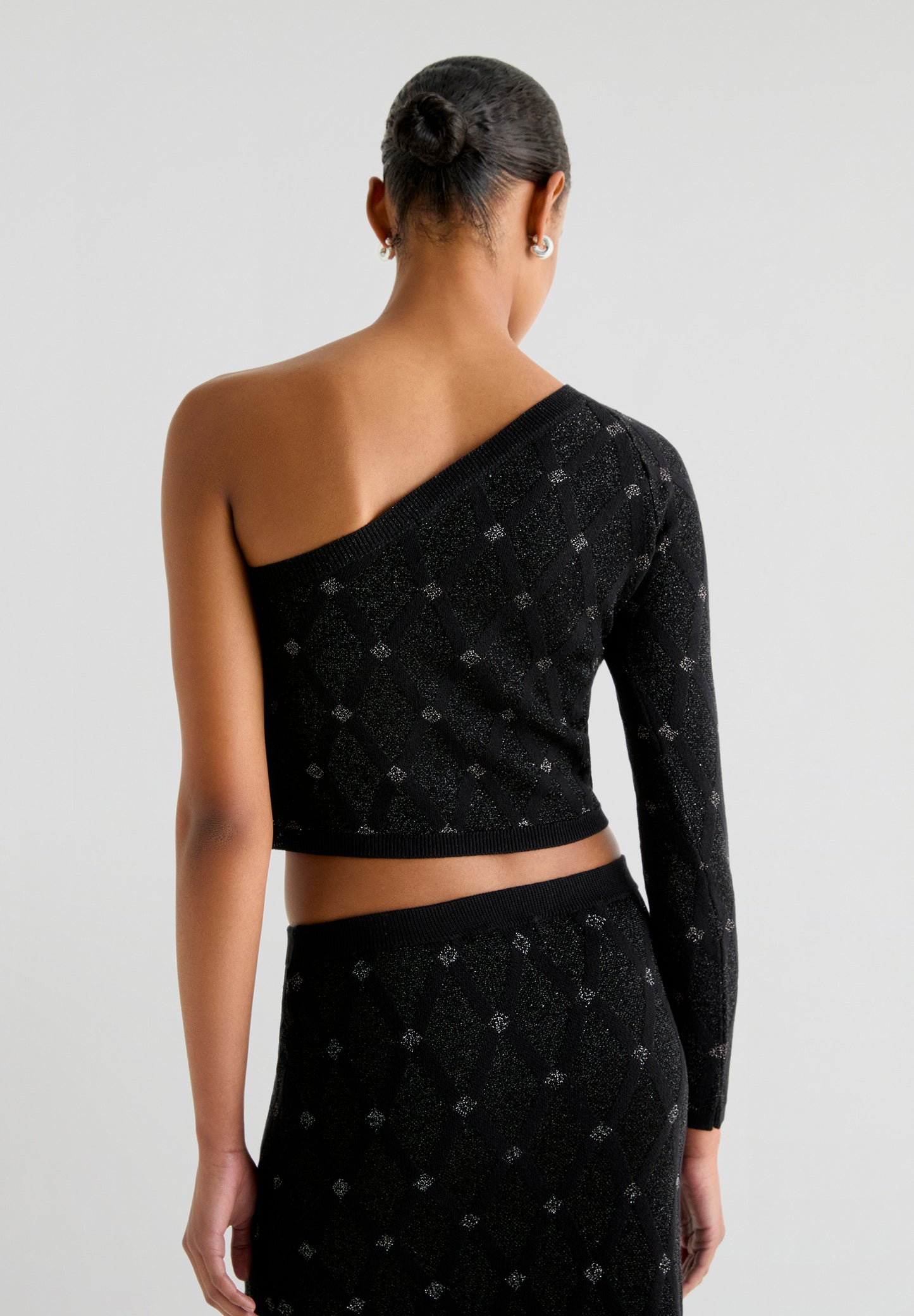 TOP PUNTO ASIMÉTRICO