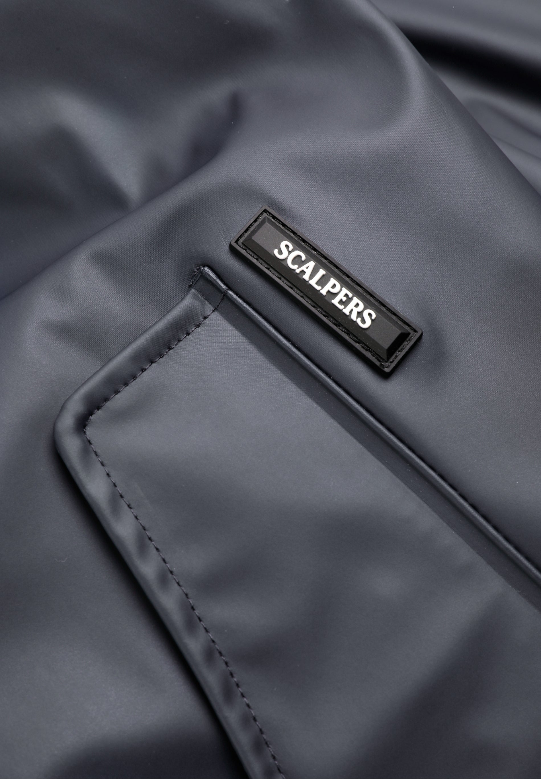 CHAQUETA IMPERMEABLE LOGO - Scalpers