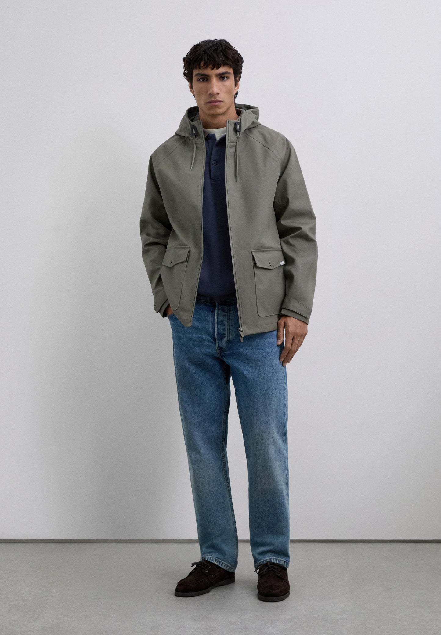 CHAQUETA IMPERMEABLE LOGO