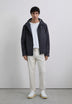 CHAQUETA IMPERMEABLE CAPUCHA ADN