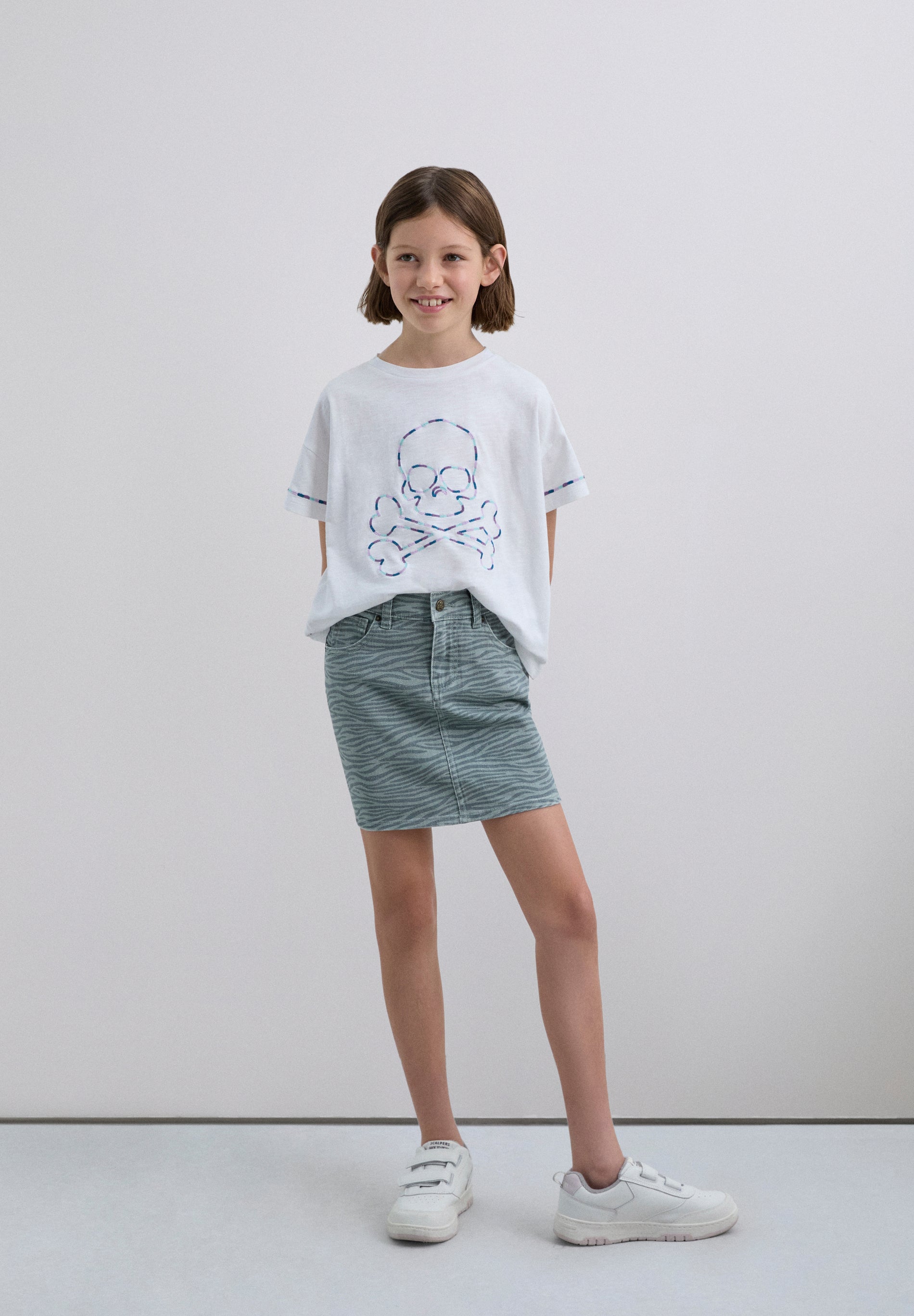 FALDA MINI ESTAMPADO CEBRA
