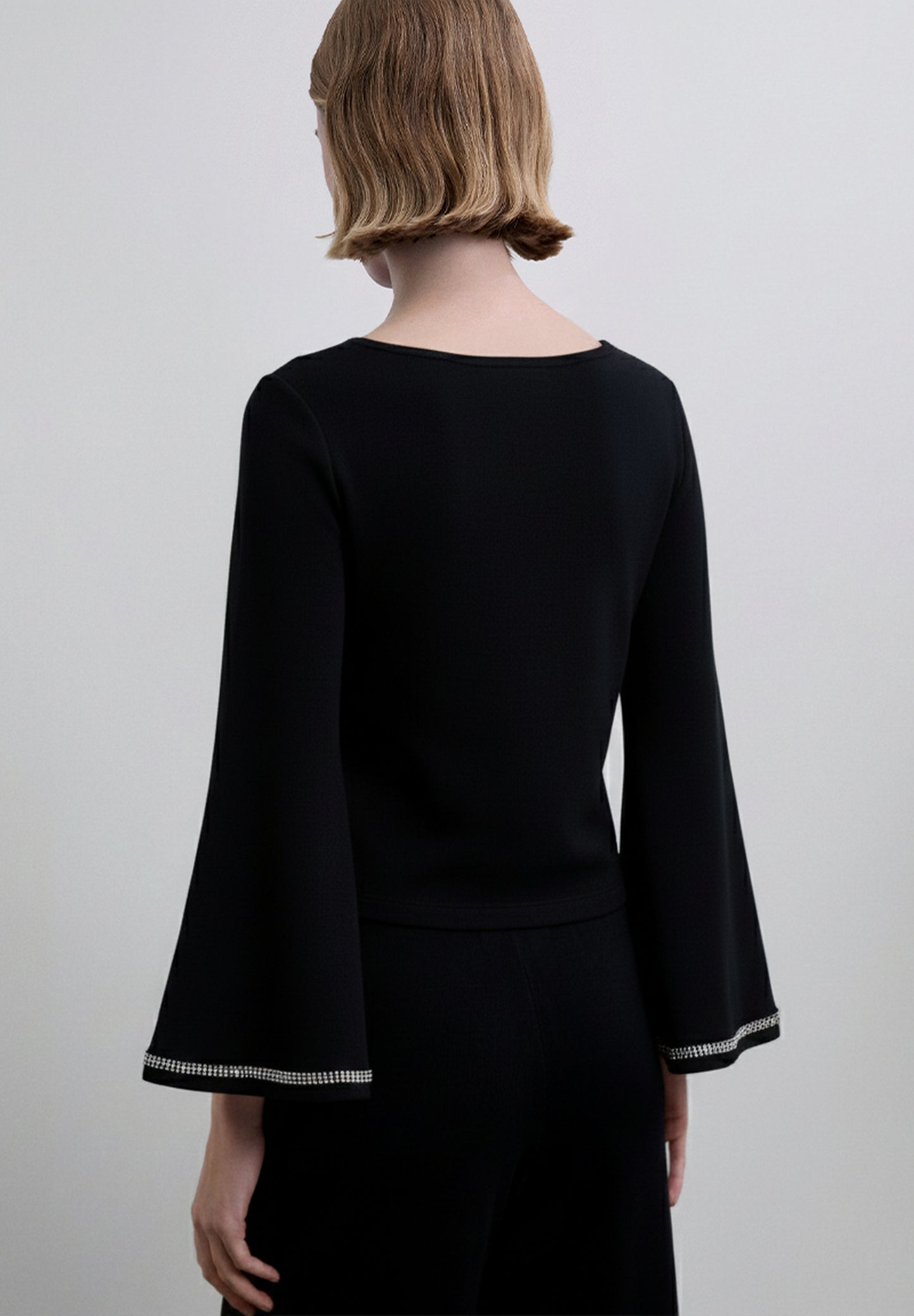 JERSEY DETALLES LENTEJUELAS