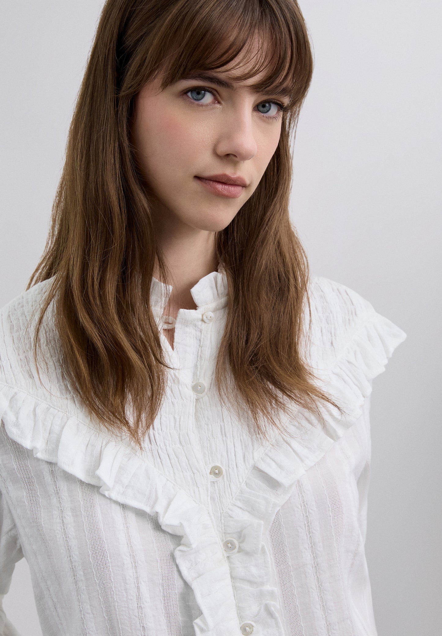 BLUSA FRUNCIDA CON VOLANTE