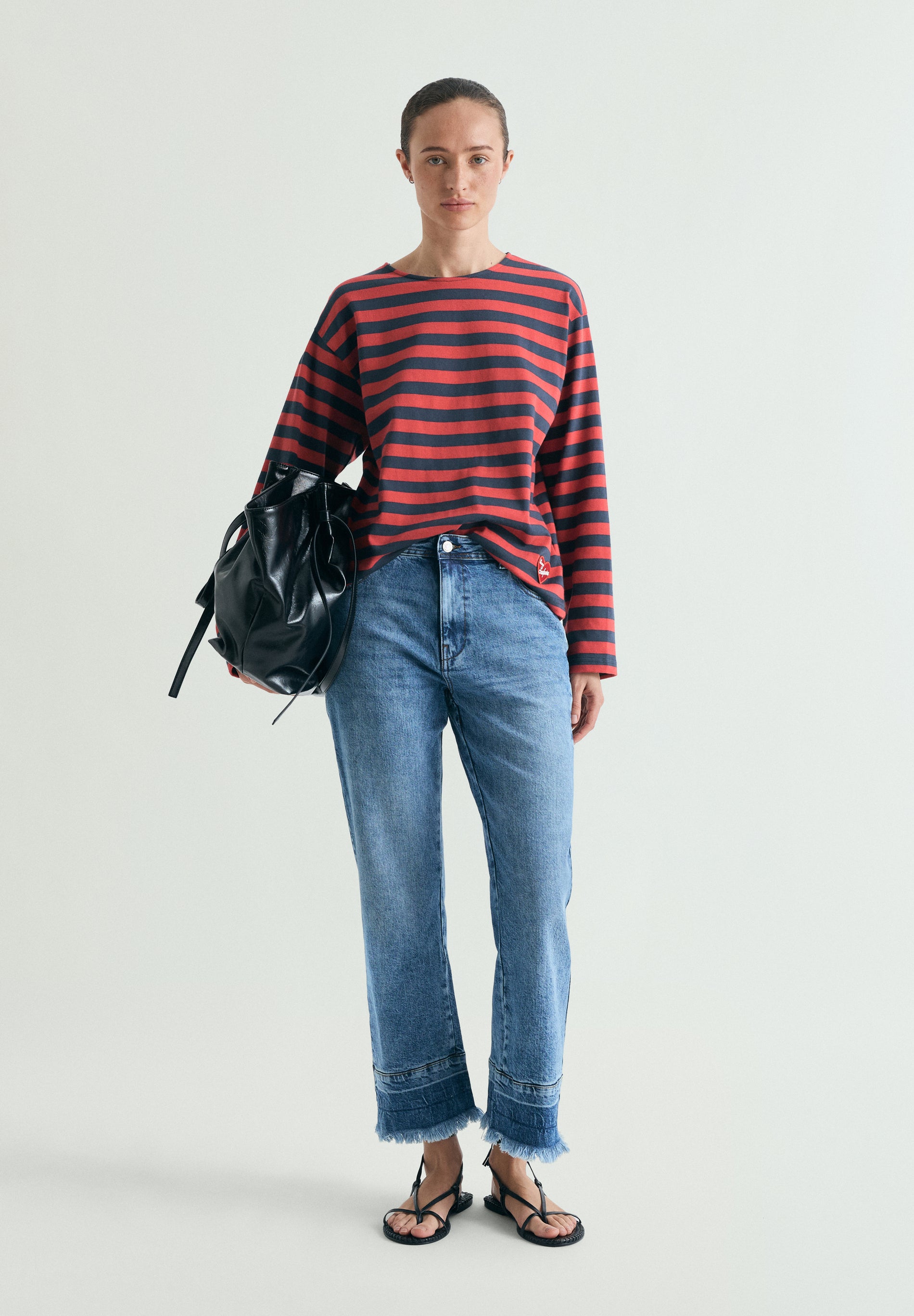 JEANS EFECTO LAVADO DESFLECADOS