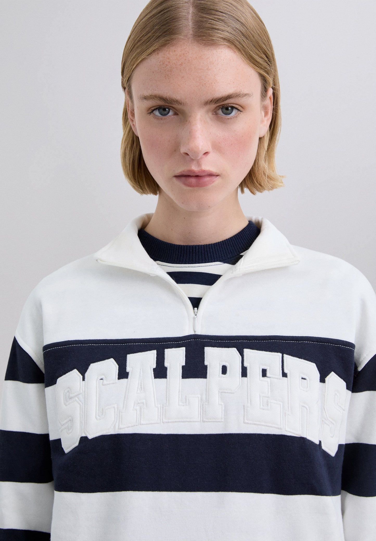 SUDADERA DE RAYAS CON LOGO