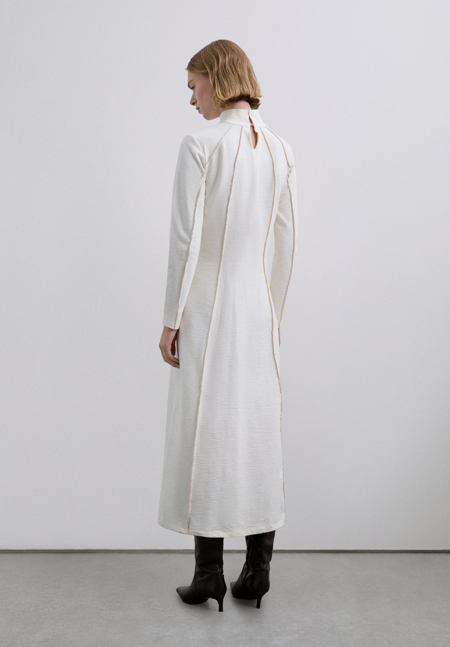 VESTIDO MIDI PUNTO OVERLOCK