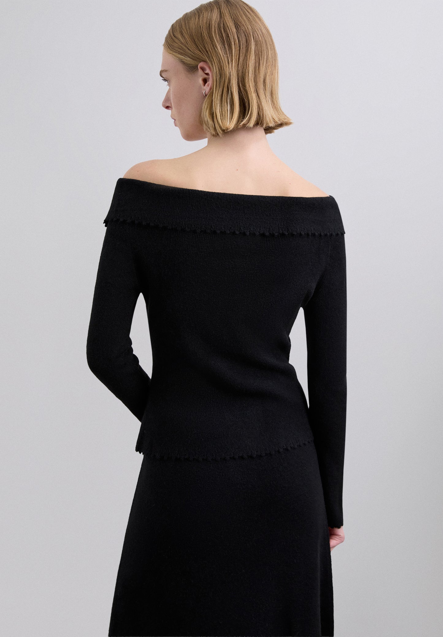 JERSEY CON HOMBROS DESCUBIERTOS