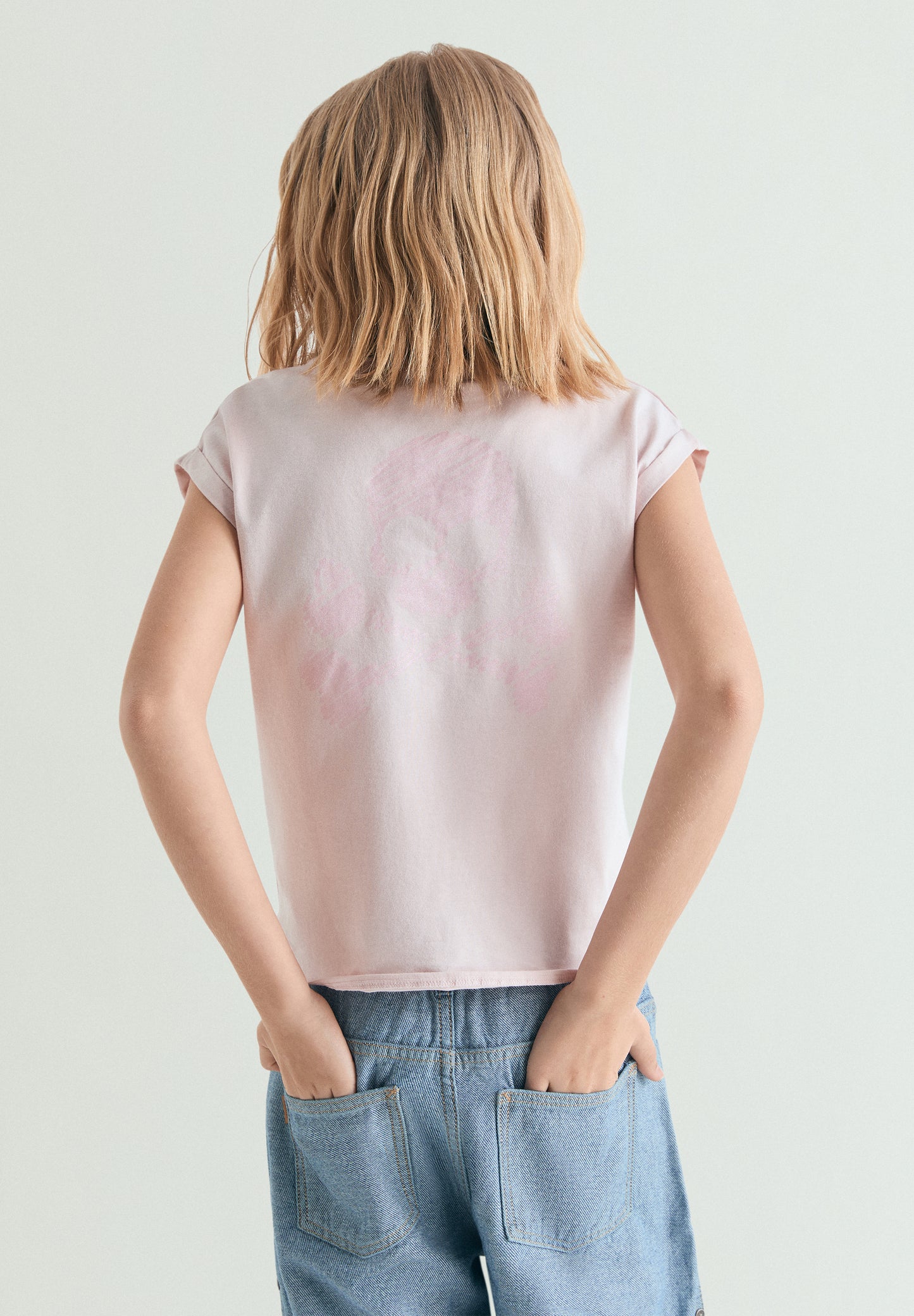 CAMISETA CON NUDO Y CALAVERA