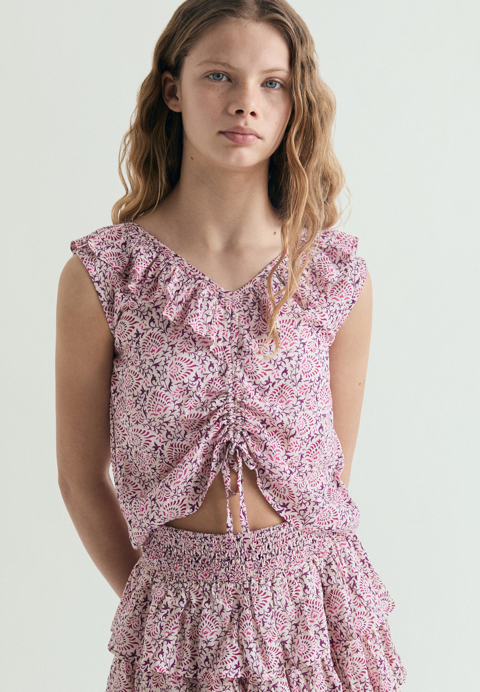 BLUSA FLUIDA ESTAMPADA