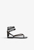 SANDALIAS PIEL CUENTAS