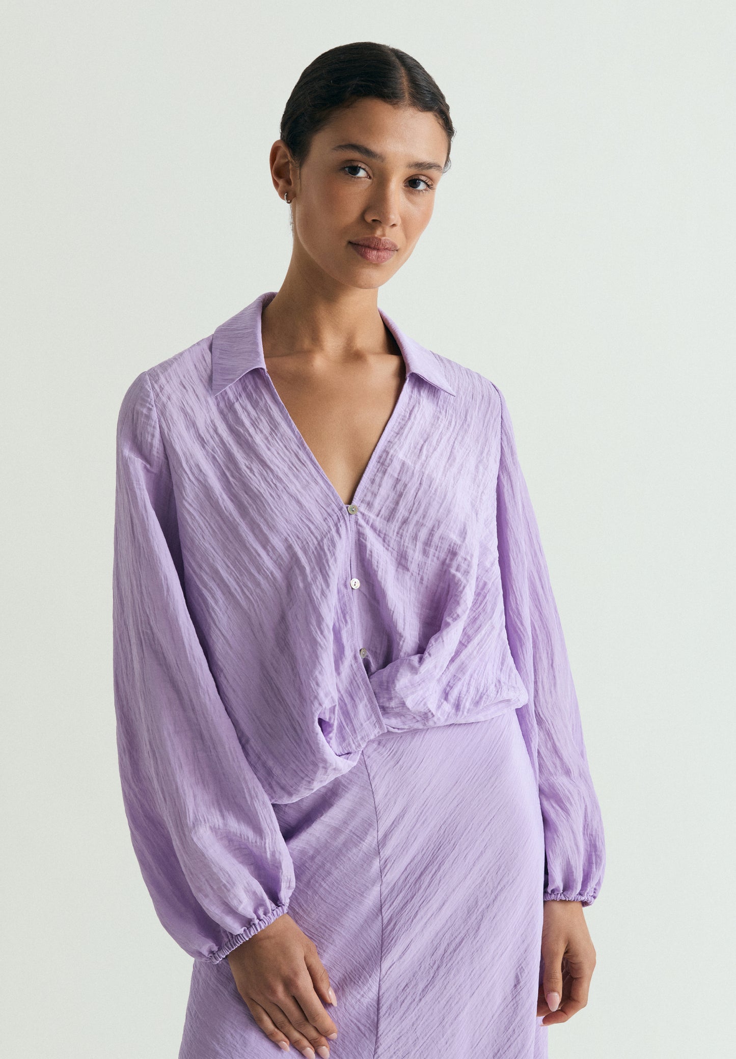 BLUSA FLUIDA DETALLE CRUZADO