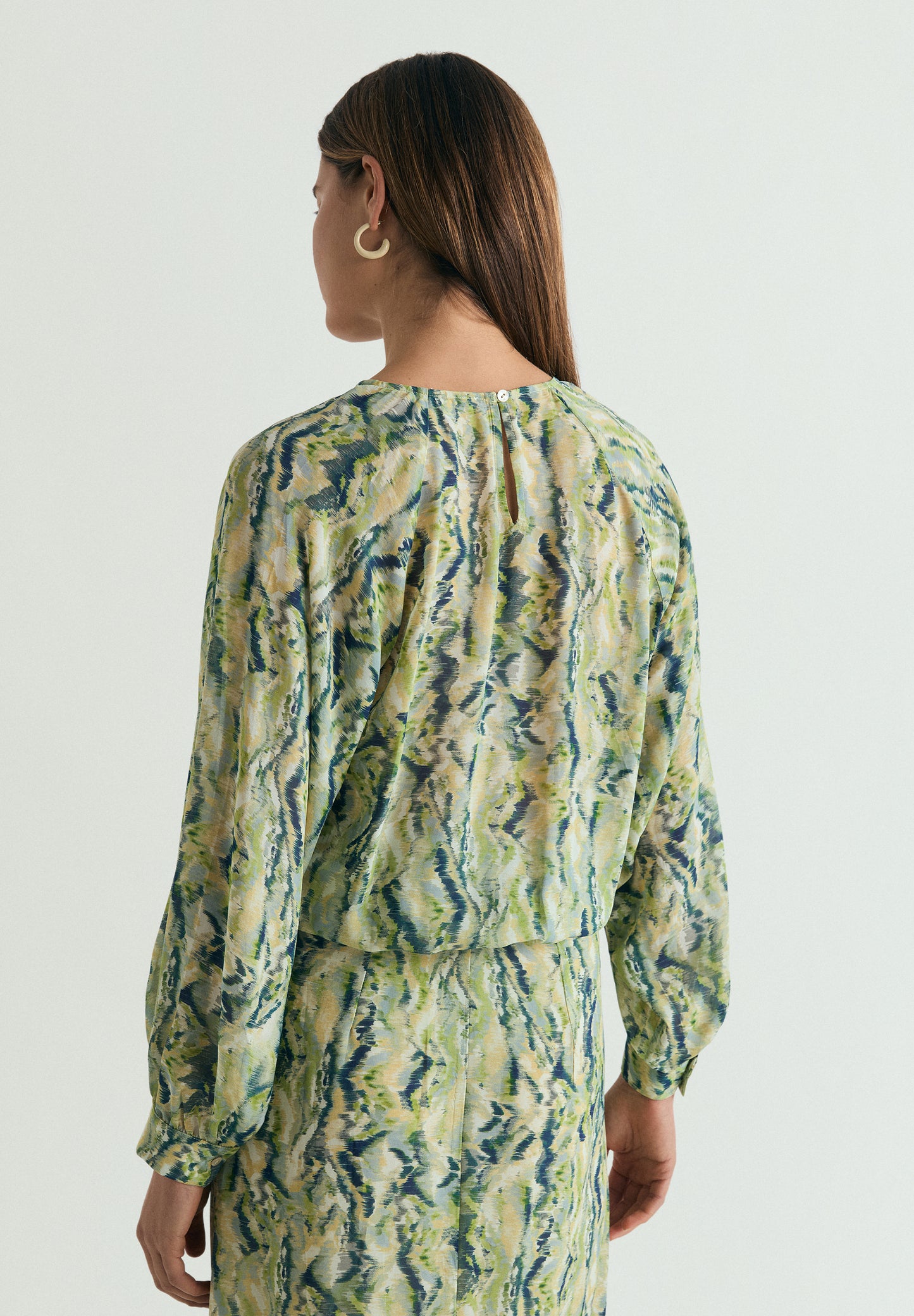 BLUSA FLUIDA ESTAMPADA