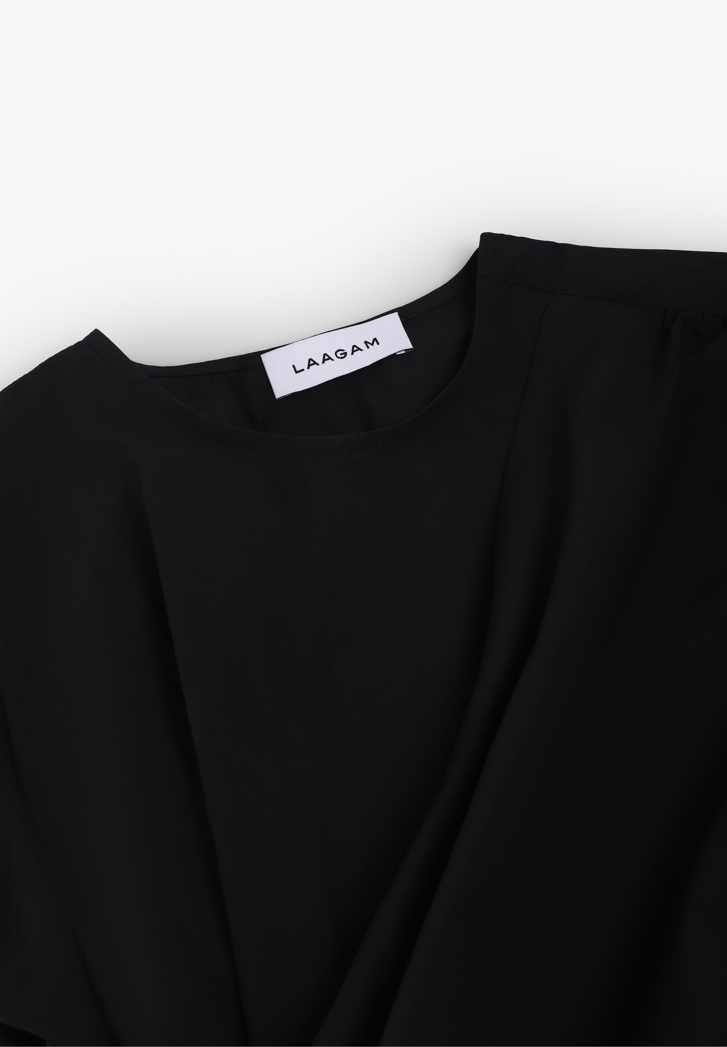 LAAGAM | BLUSA ASIMÉTRICA RAVEN