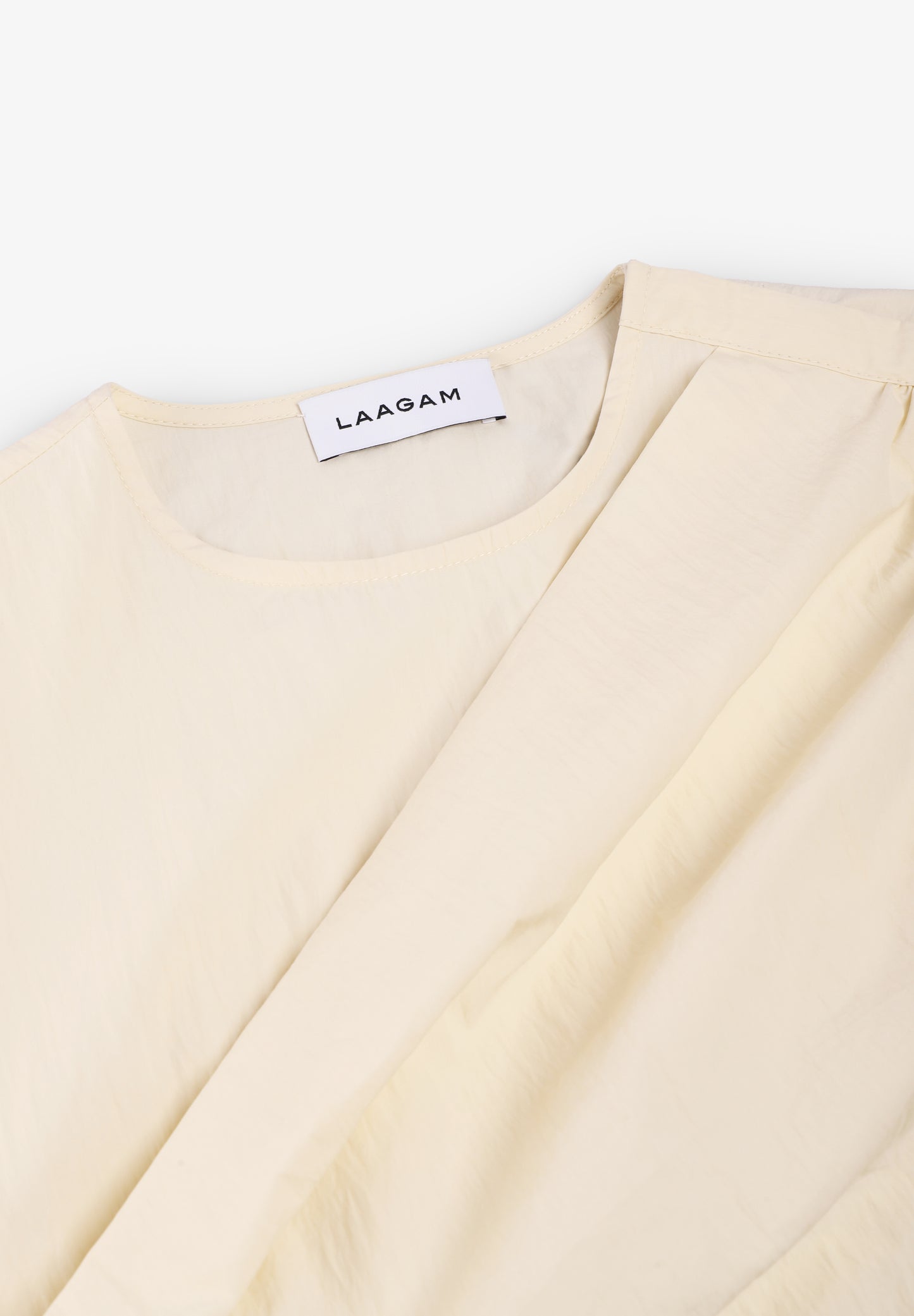 LAAGAM | BLUSA ASIMÉTRICA RAVEN