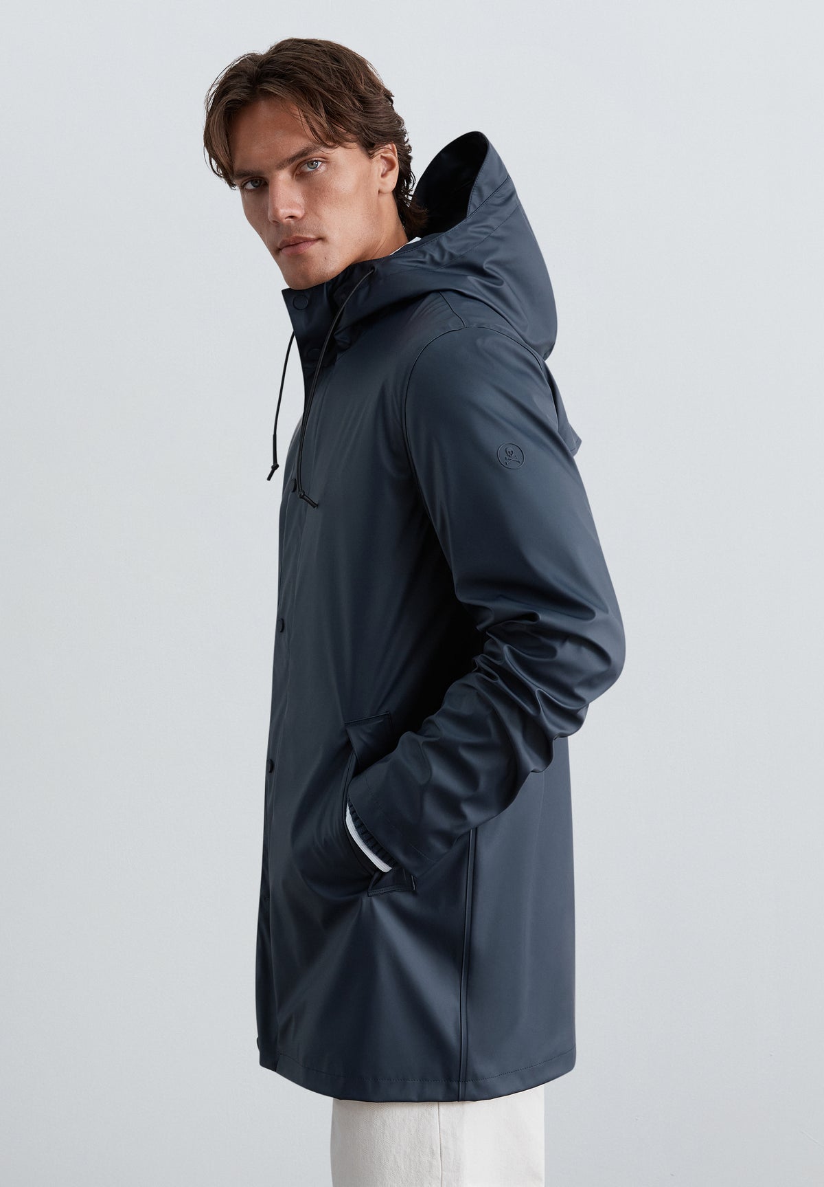 CHAQUETA IMPERMEABLE LOGO