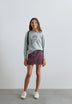 FALDA CORTA DENIM ESTAMPADA