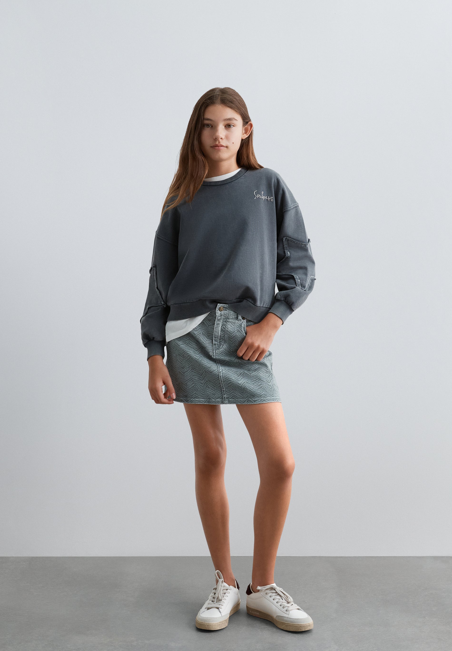 FALDA CORTA DENIM ESTAMPADA