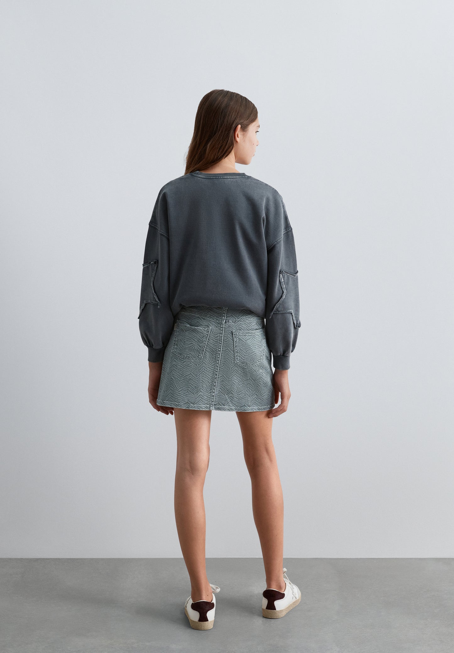 FALDA CORTA DENIM ESTAMPADA