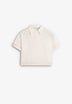 LACOSTE | POLO OVERSIZED SARGA MUJER
