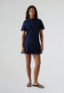 LACOSTE | VESTIDO POLO FALDA TABLAS MUJER