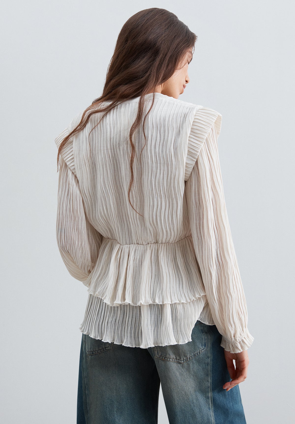 BLUSA PLISADA VOLANTES
