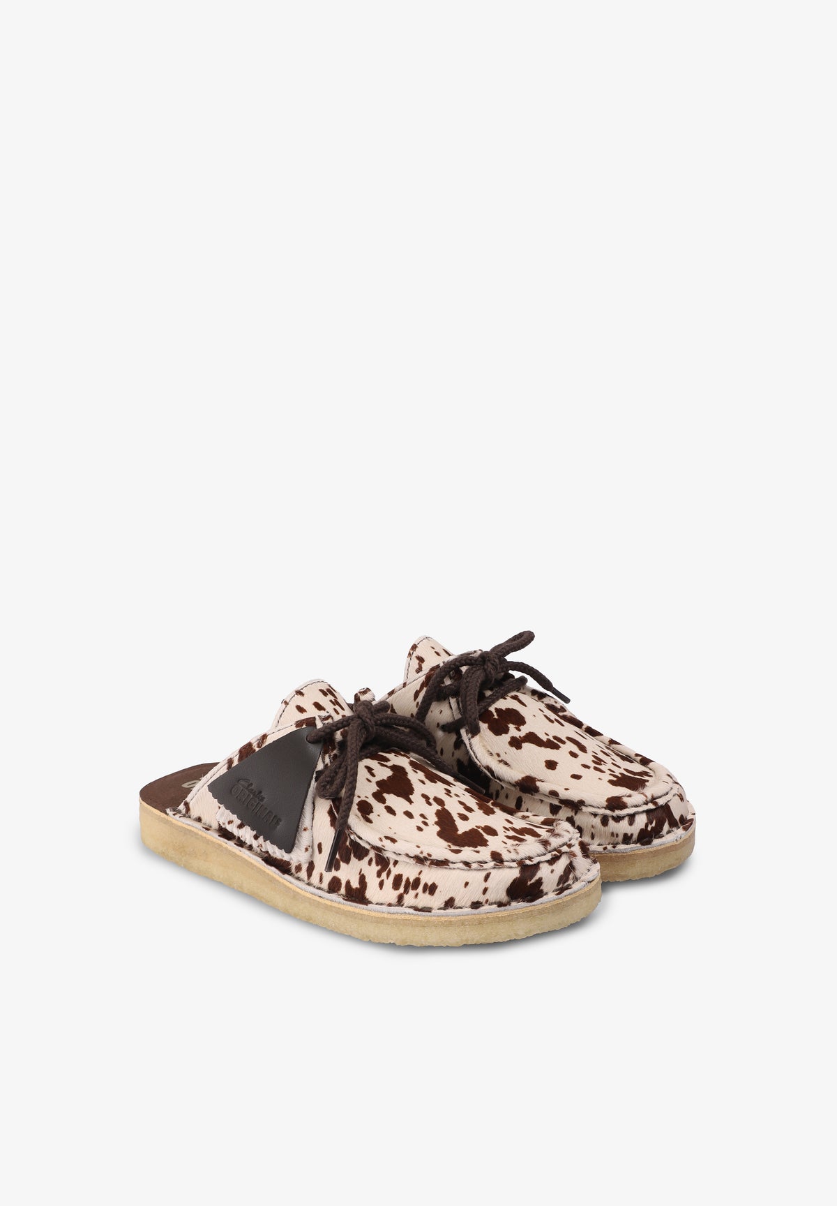 CLARKS | NOMAD MULE COW PRINT