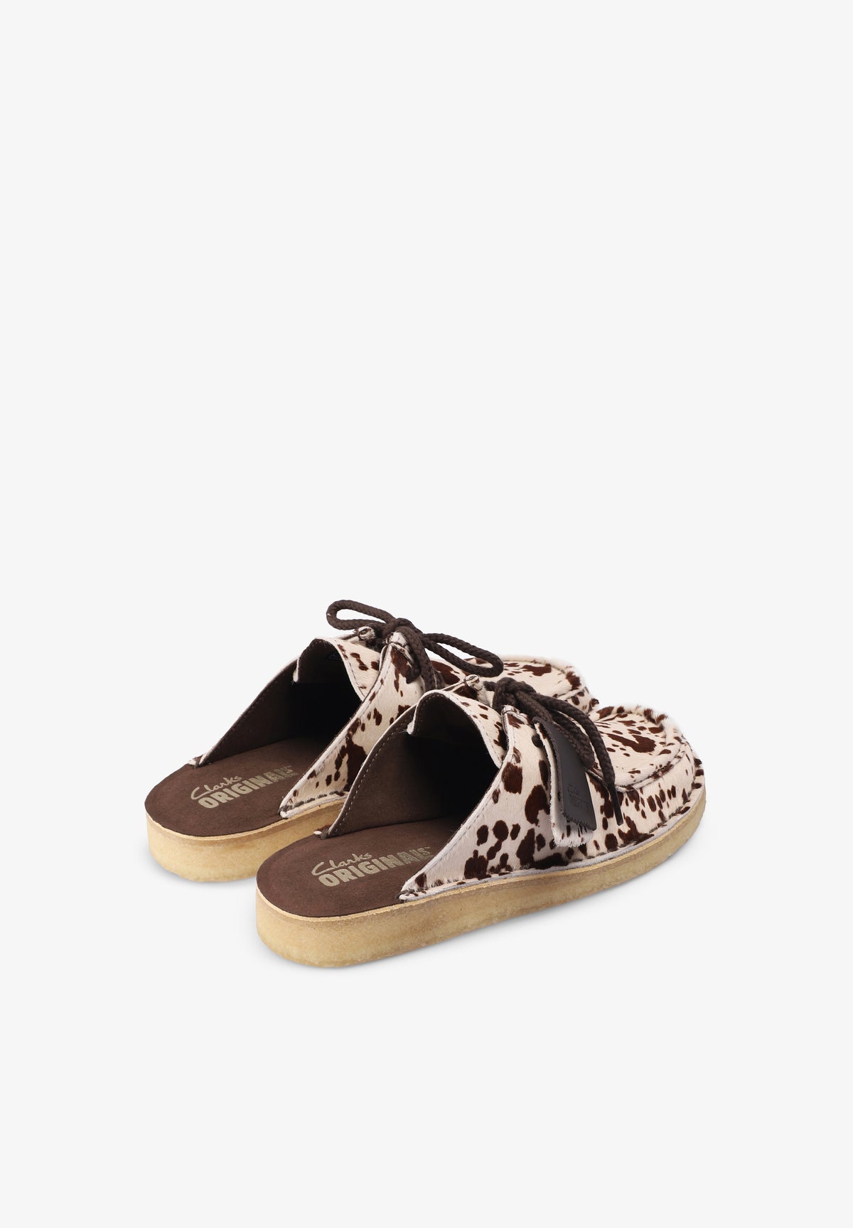 CLARKS | NOMAD MULE COW PRINT