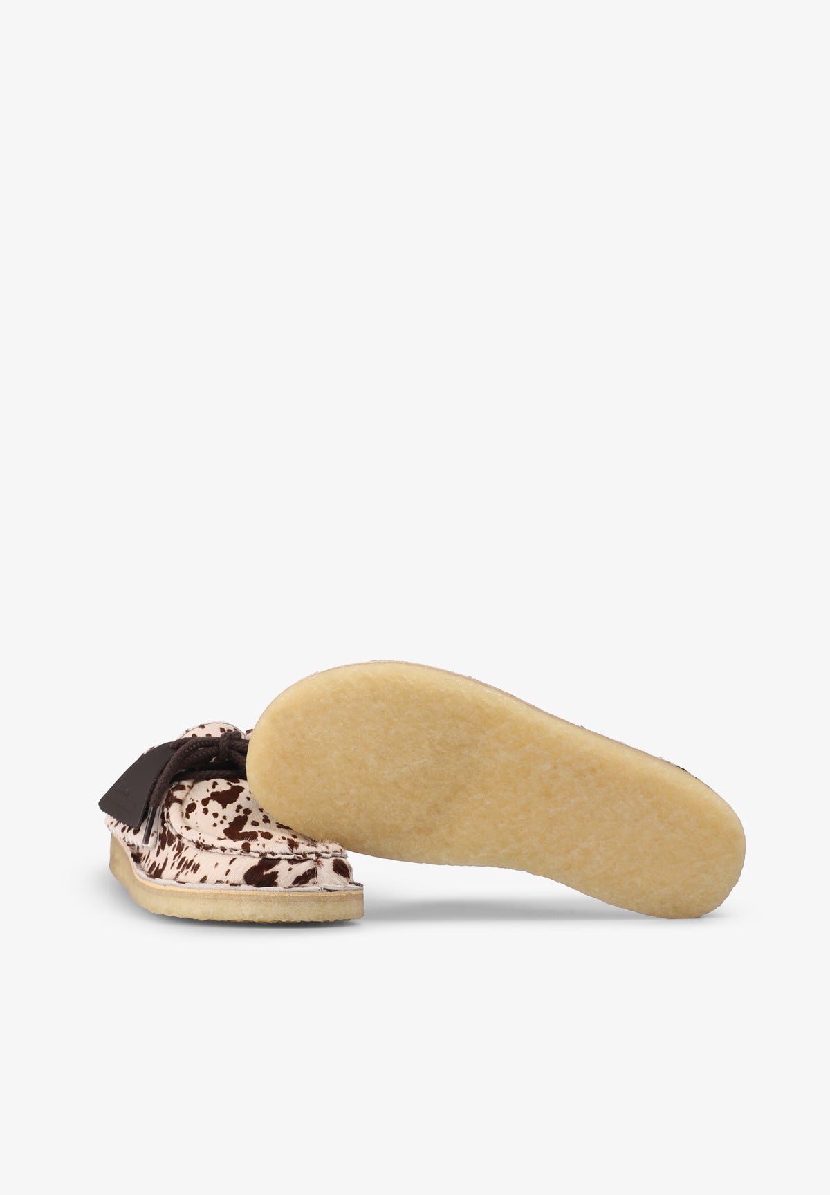 CLARKS | NOMAD MULE COW PRINT