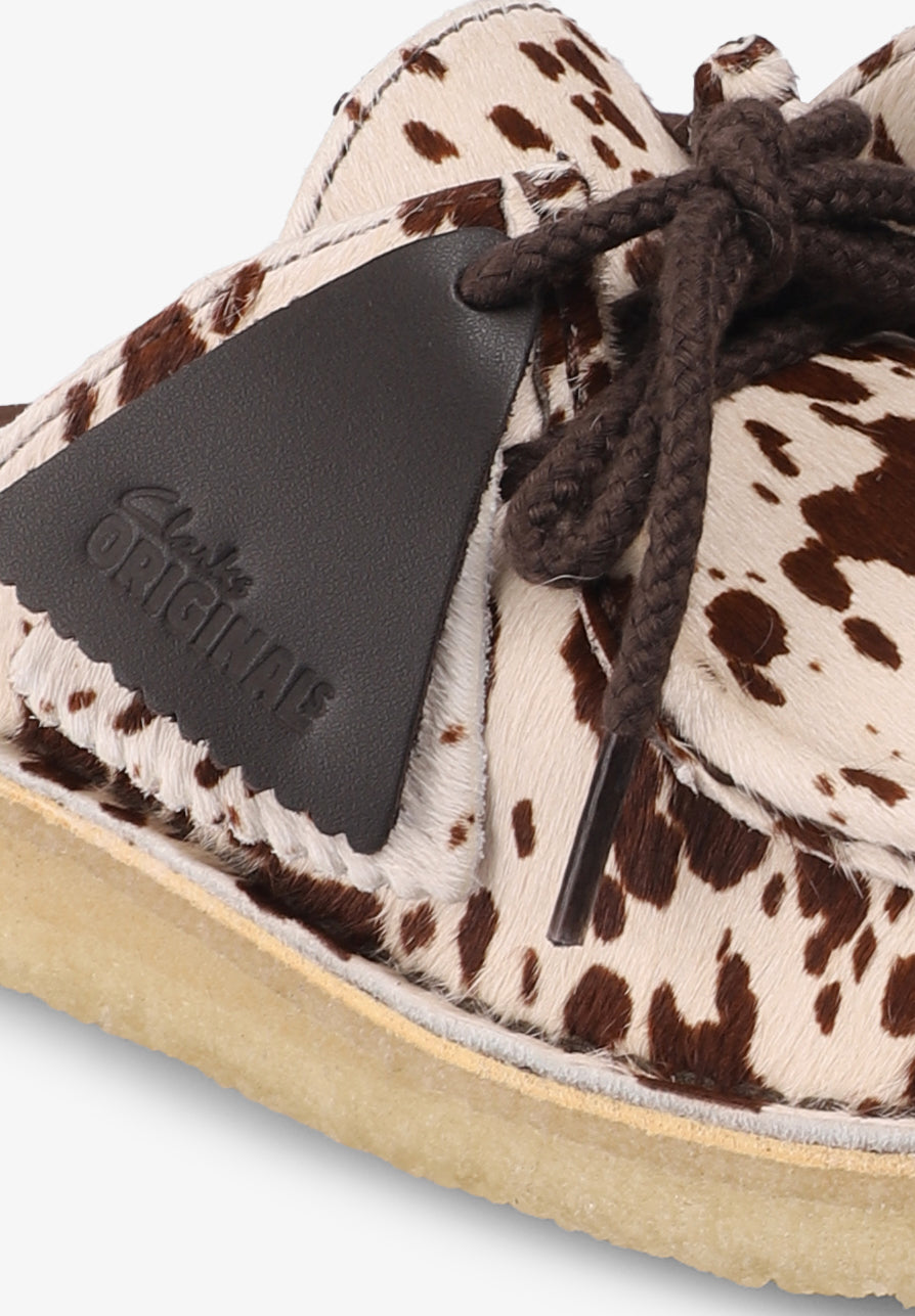 CLARKS | NOMAD MULE COW PRINT