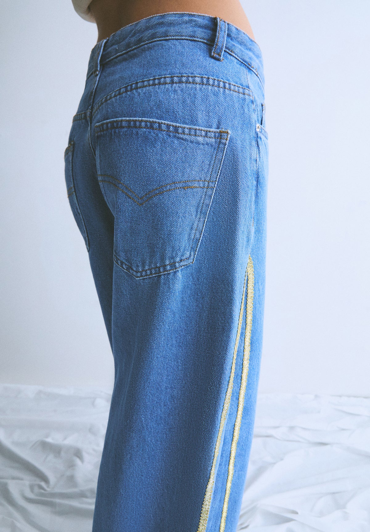 JEANS TIRAS LATERALES