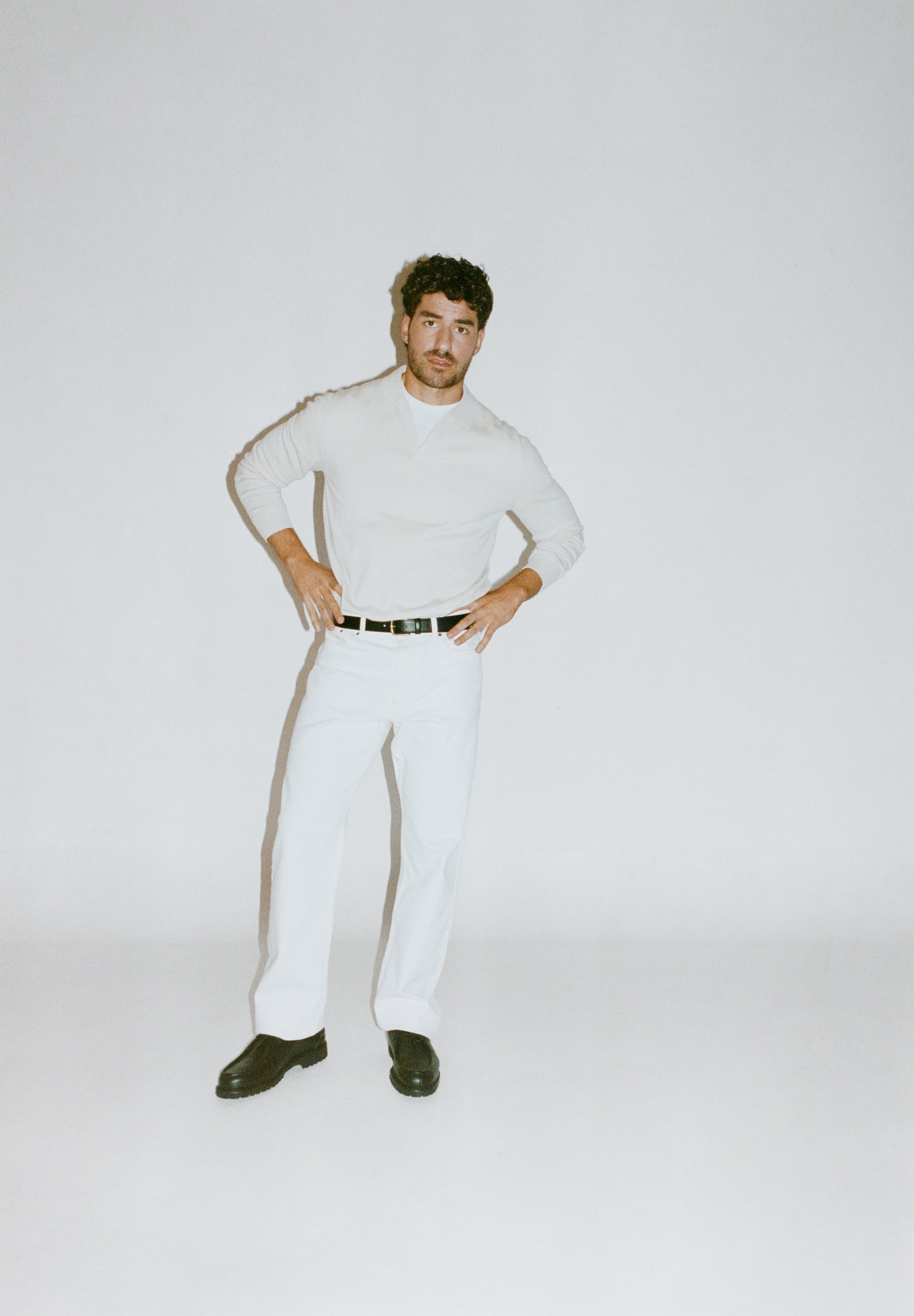 JERSEY POLO CUELLO PICO LANA