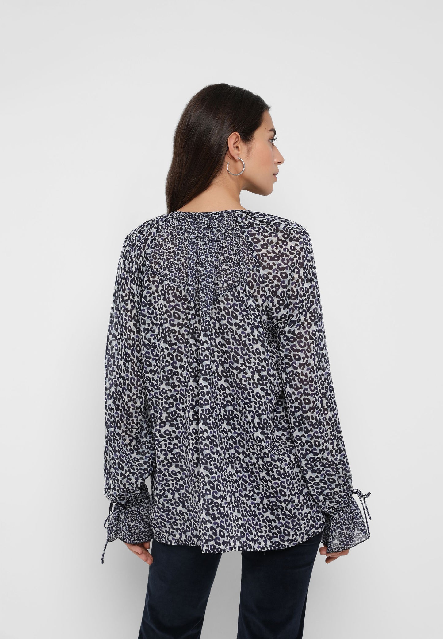 BLUSA SEMITRANSPARENTE ANIMAL PRINT