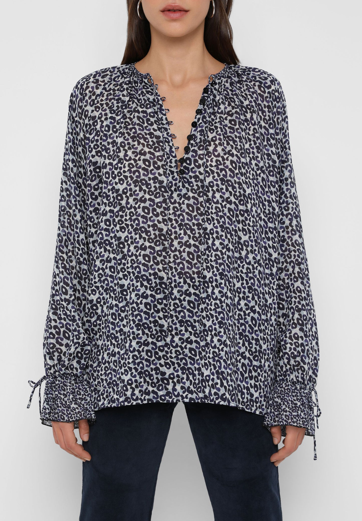 BLUSA SEMITRANSPARENTE ANIMAL PRINT