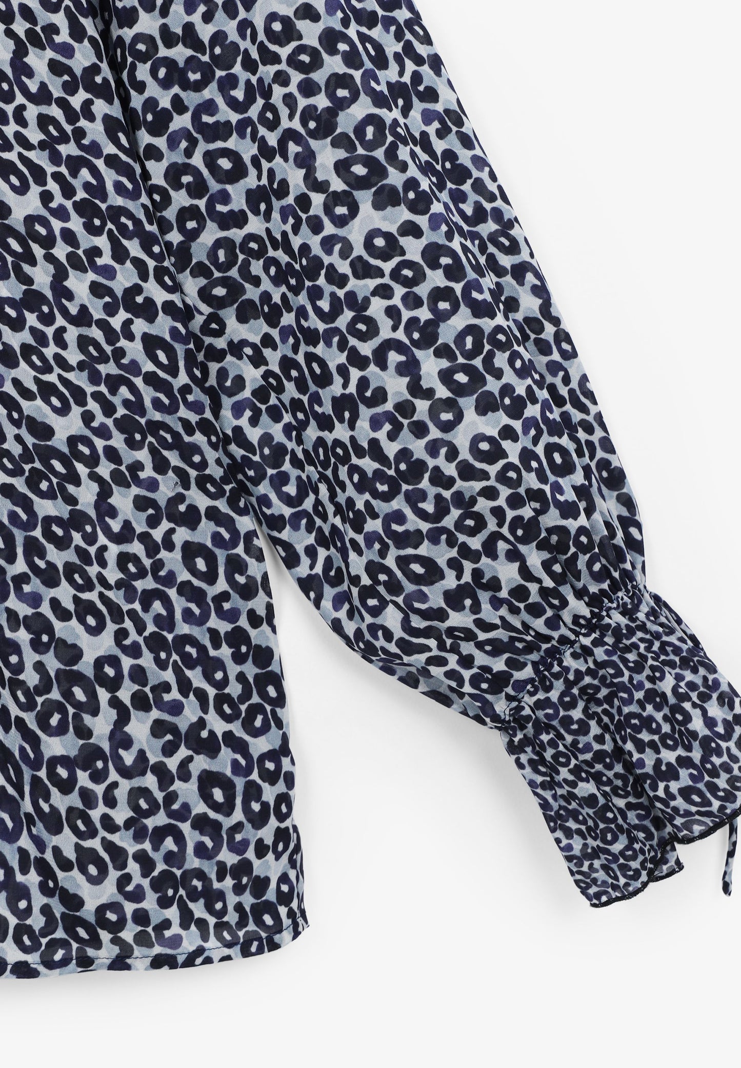 BLUSA SEMITRANSPARENTE ANIMAL PRINT