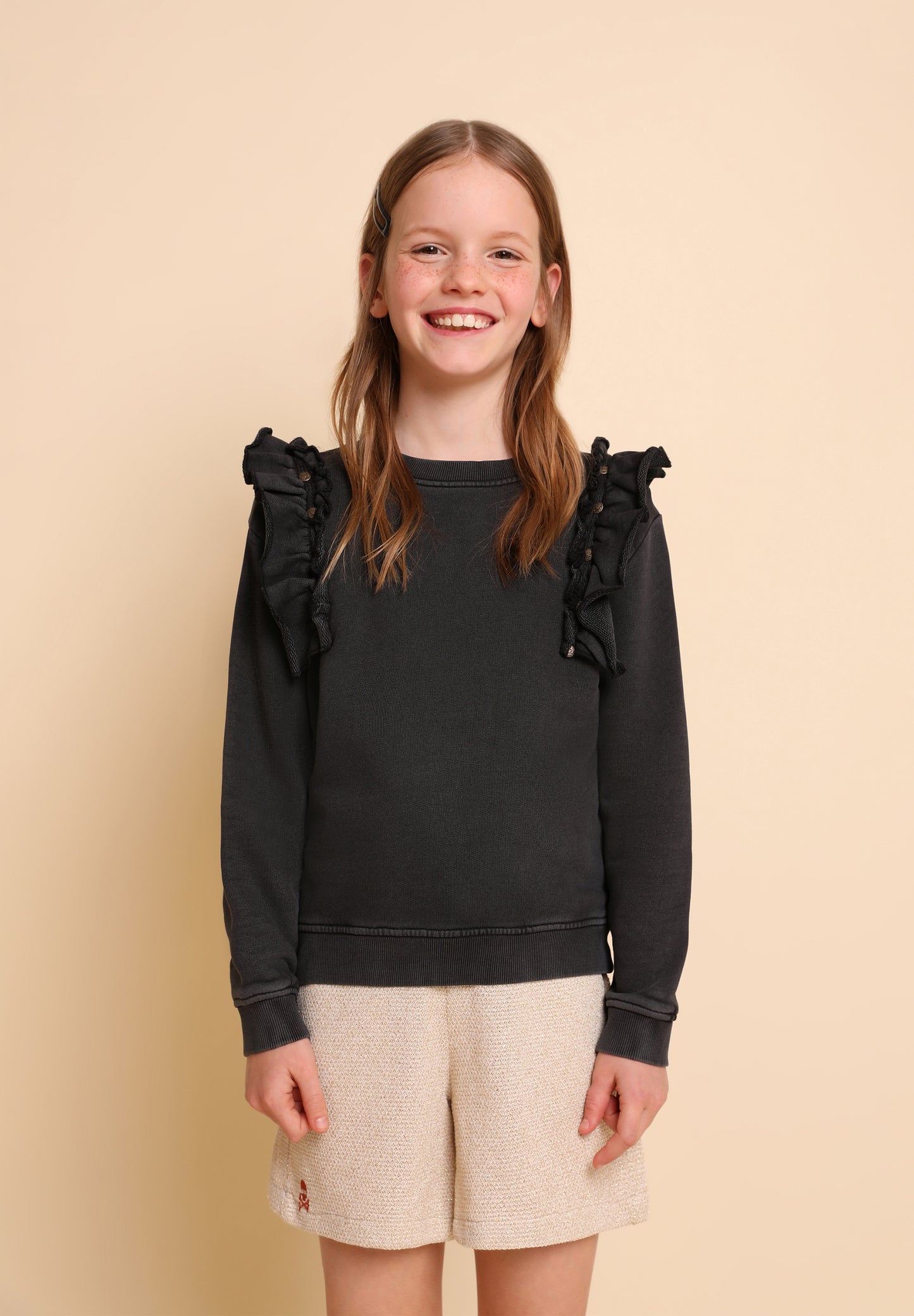 SUDADERA VOLANTE TACHUELAS