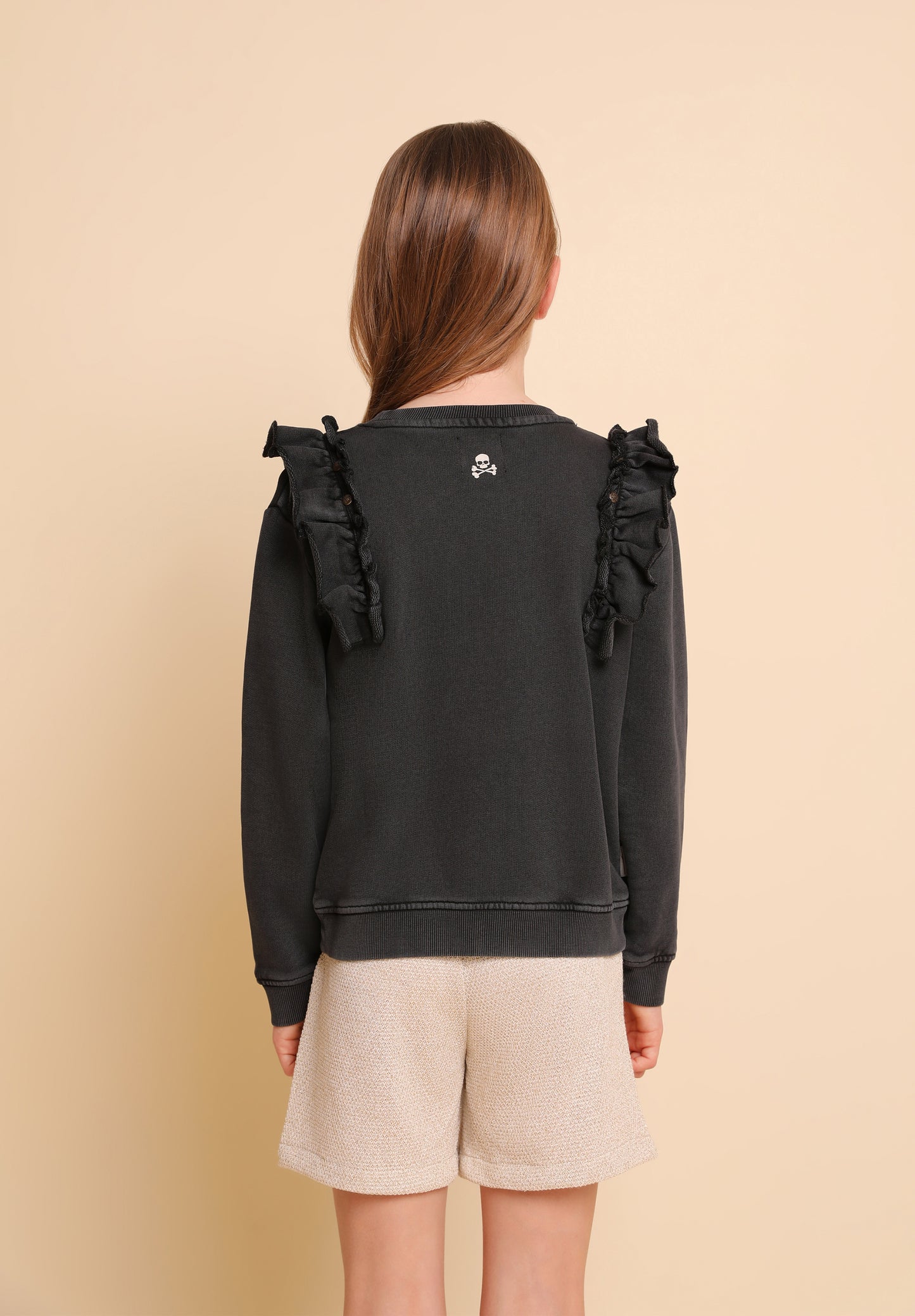 SUDADERA VOLANTE TACHUELAS