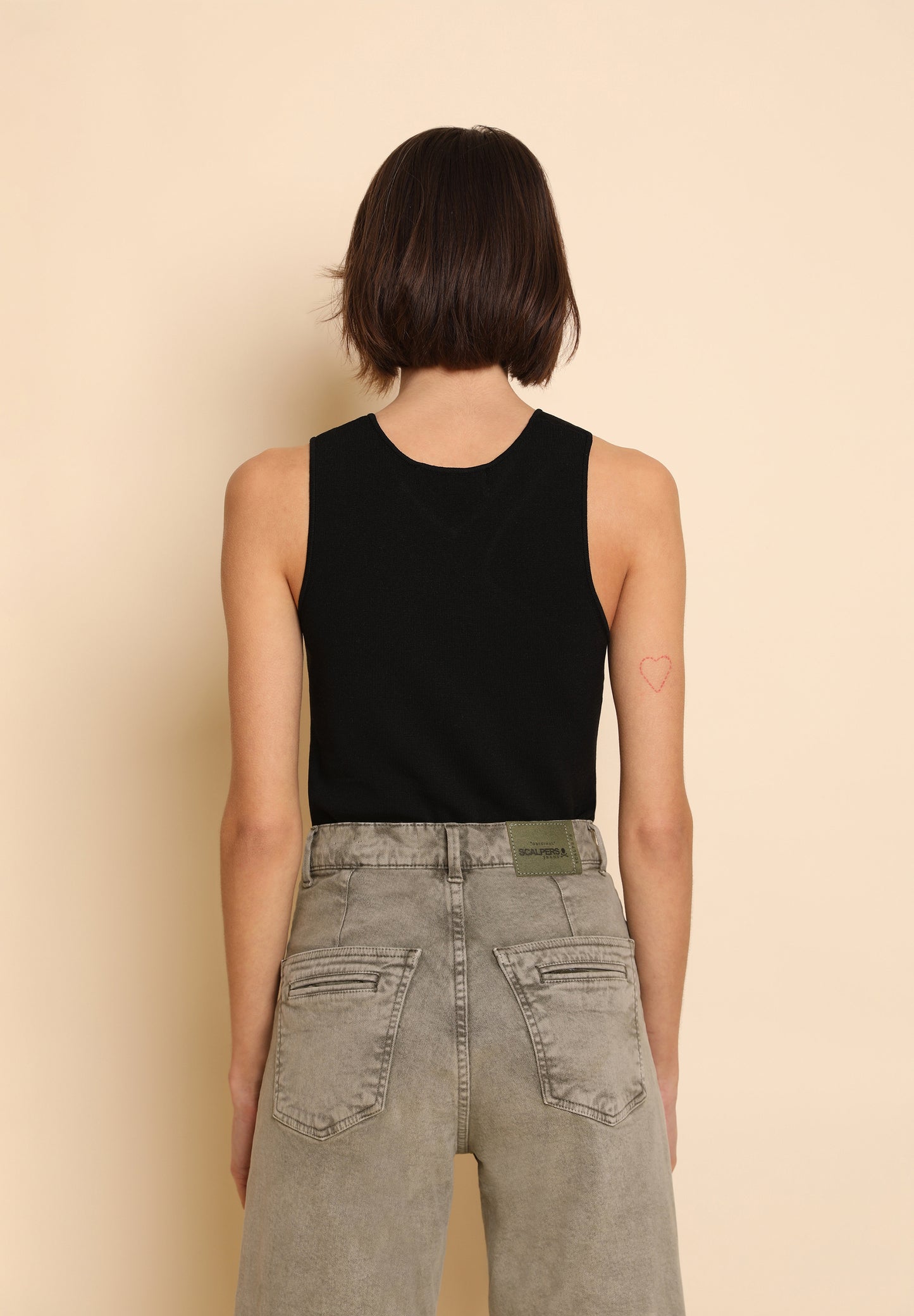 TOP PUNTO ASIMÉTRICO